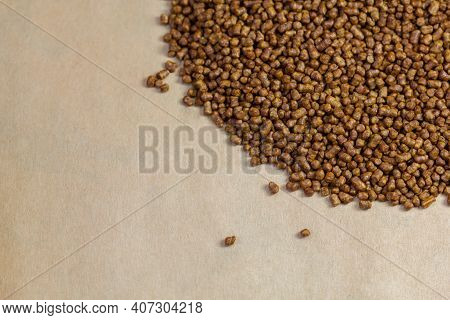 Buckwheat Tea On A Brown Background Copy Space. Isolate. Buckwheat Tea Close-up Macro Photography. S