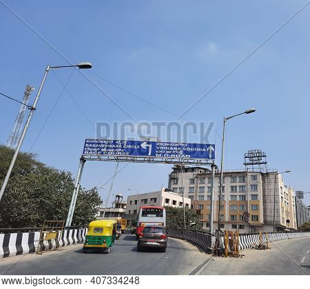 Closeup Of Heavy Traffic In A Sangolli Rayanna Statue Circle And Beautiful View Of Flyover Or Bridge