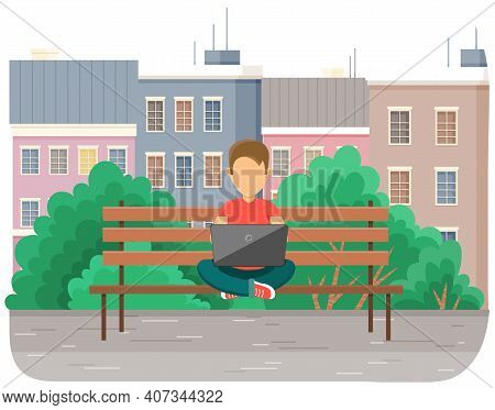 Boy In Yoga Pose Siting On The Bench In Park With Laptop, Works In Nature, Typing On The Keyboard. C