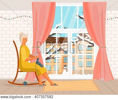 Elderly Woman Knitting A Scarf And Looking Out The Window In Winter. Person Works With Threads. Fema