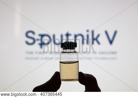 Oxford, Uk - February 2020: Sputnik V Covid Vaccine Logo With Injection Vial