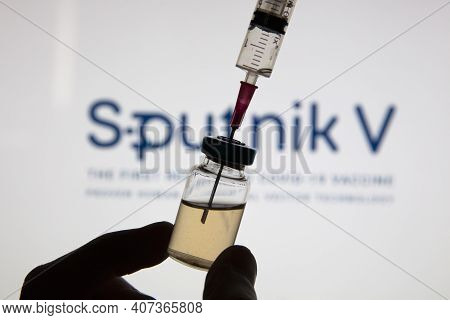Oxford, Uk - February 2020: Sputnik V Covid Vaccine Logo With Syringe And Vial
