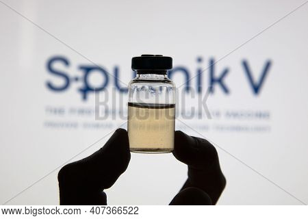 Oxford, Uk - February 2020: Sputnik V Covid Vaccine Logo With Injection Vial