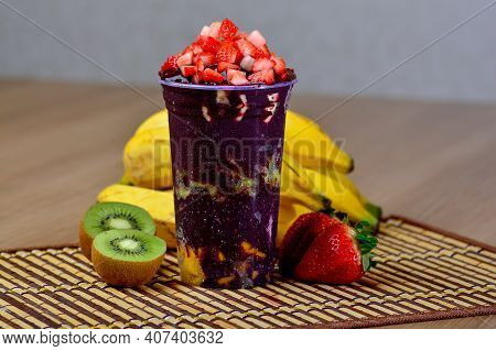 Acai Cup With Strawberry Topping Banana, Kiwi, Delicious Brazilian Açaí Creamy