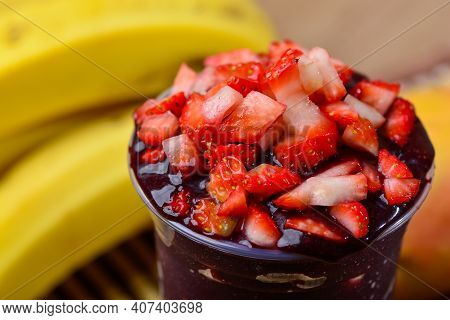 Acai Cup With Strawberry Topping Banana, Kiwi, Delicious Brazilian Açaí Creamy, Closeup View