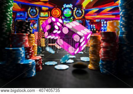 Casino rolling dice and chips on the gamblingtable