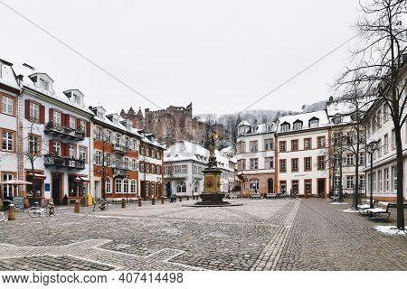 Heidelberg, Germany - February 2020: Square Called 'kornmarkt' In Old City Center With Fountain And 