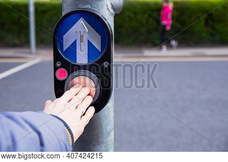 Male Hand Pushing Button For Traffic Light. Use Traffic Lights At The Crossroads. Button Of The Mech