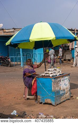 Kolhari, Karnataka, India - November 8, 2013: Roadside Booth Where Female Vendor Sells Home-made Sma