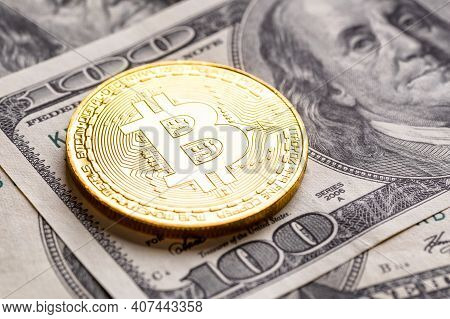 Golden Bitcoin Lies On The Banknotes.new Virtual Money. Crypto Currency Top View. Real Coins Of Bitc
