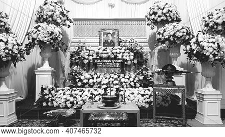 Bangkok, Thailand - December 1, 2020: Thai Style Funeral Decorated With Incense Burner And Lots Of F