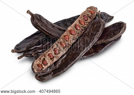 Ripe Carob Pods And Bean Isolated On White Background With Clipping Path And Full Depth Of Field