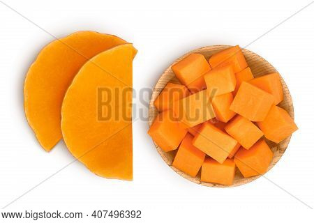 Butternut Squash Diced In Wooden Bowl Isolated On White Background With Clipping Path . Top View. Fl