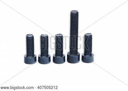 Group Of Black Hex Screws With Hex Cap Head Close Up Isolated On White Background