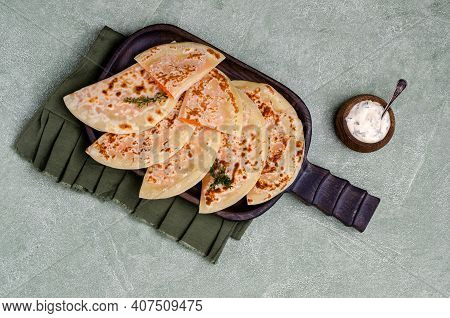 Baked Bread With Vegetable Filling On A Stone Background. Selective Focus.