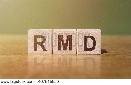 Rmd - Required Minimum Distributions. Word Written On Wooden Blocks On Wooden Table. Concept For You