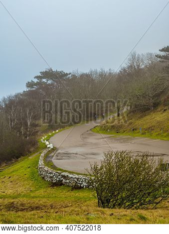 December 19, 2020 - Helsingborg, Sweden: People Are Hiking At Kullen Nature Reserve A Misty Day