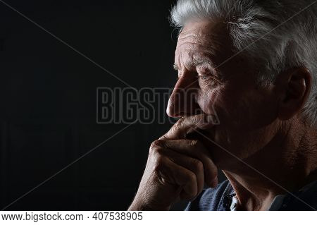 Portrait Of A Sad Thinking Senior Man