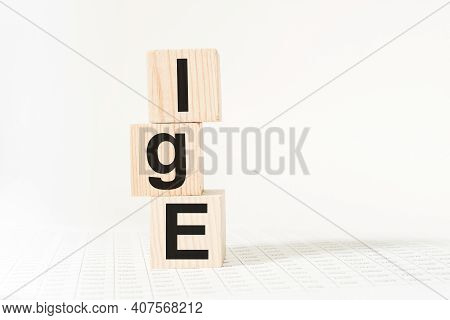 Word Ige On Wooden Blocks. Medical Concept . The Medicine