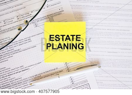 Yellow Sticker With Text Estate Planing On Financial Docs. Notepad, Eyeglasses And White Pen