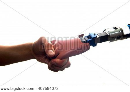 Human Hand Touches Prosthetic Hand