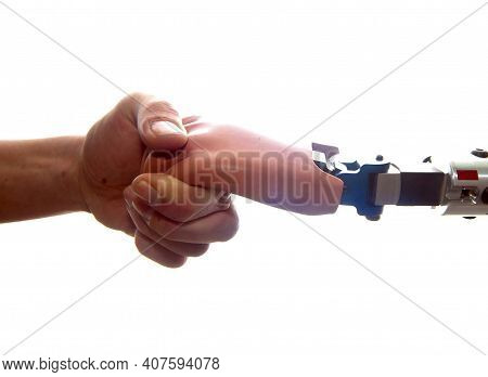 Human Hand Touches Prosthetic Hand
