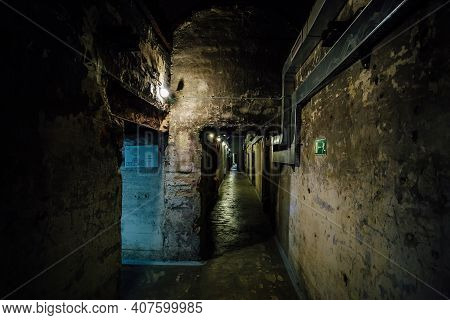 Dark Creepy Old Corridor Of Underground Bunker Or Prison