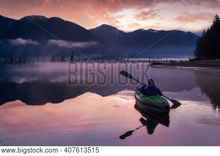 Adventurous Girl Kayaking On An Infatable Kayak In A Beautiful Lake. Colorful Peaceful Sunrise Art R