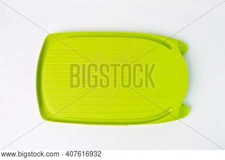 Klang,malaysia:february 11, 2021-green Chopping Board Over White Background. Tupperware Brand.