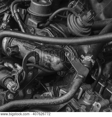 Car Repair, Car Service Concept. Fragment Of  Engine Compartment Of Diesel Truck. Engine, Exhaust Ma