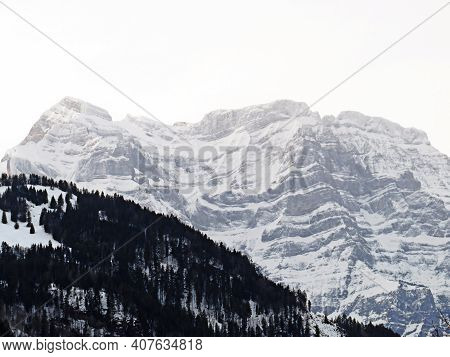 Rocky Snowy Alpine Peaks Vrenelisgärtli (vrenelisgaertli Or Vrenelisgartli) And Ruchen During Winter