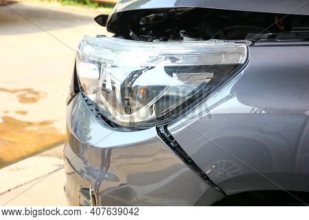 Gray Pick Up Car Broken On Front Of The Car