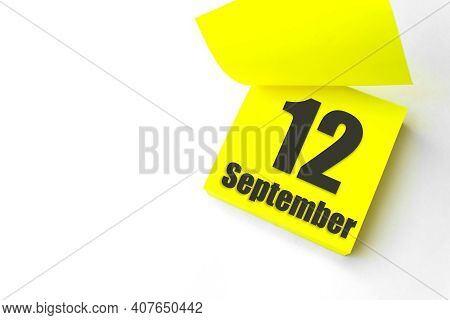 September 12nd. Day 12 Of Month, Calendar Date. Close-up Blank Yellow Paper Reminder Sticky Note On 