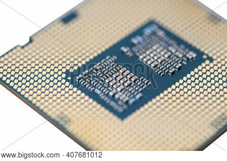 A Macro Photo Of A Modern Cpu Processor Under The Lga 1200 Socket On A Green Circuit Board, Isolated