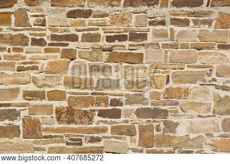 Castle Wall Made Of Old Stones Textures For Design And Photo Background.