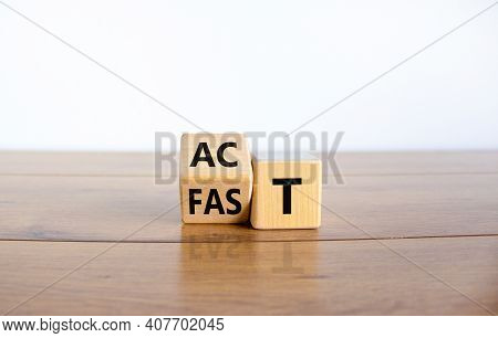 Time To Act Fast Symbol. Turned A Wooden Cube With Words 'act Fast'. Beautiful Wooden Table, White B