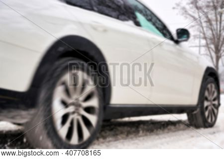 Blurred Car With Motion Blur On A Slippery Road In Winter