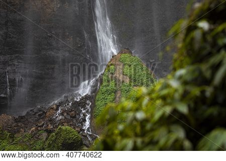 View Of The Fresh, Noisy And Intense Water In Tumpak Sewu Waterfall, In East Java, Indonesia.