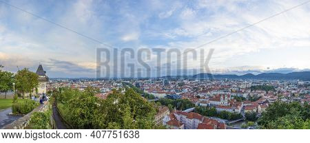 Graz, Austria 14.08.2020 Cityscape Of Graz And The Clock Tower (grazer Uhrturm), Famous Tourist Attr