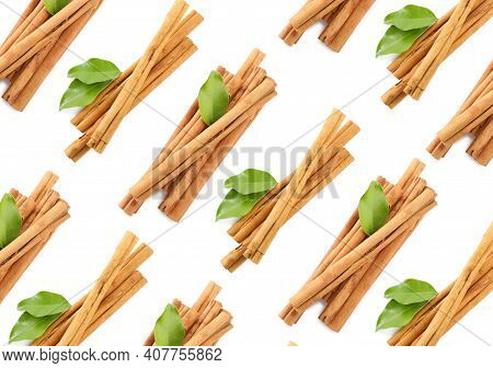 Set With Aromatic Cinnamon Sticks On White Background, Top View
