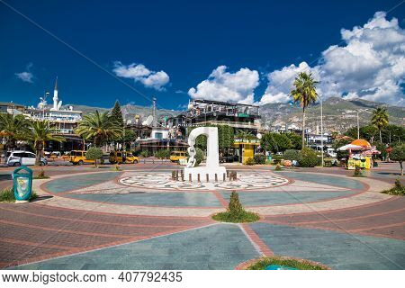 Alanya , Turkey- October 20, 2020:   Old Town from the Alanya Marina Yat Limani embankment. Beautiful cityscape with city landmarks on a sunny day. Antalya, Turkey.