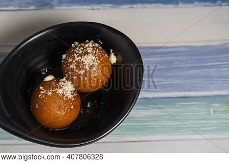 Indian Sweet Food Called Gulab Jamun Made Up Of Milk And Sugar, A Popular Dish In Festival Or Specia