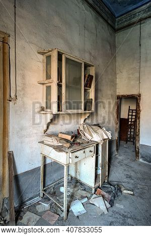 November 2020, Italy. Old Dentist\\\'s Office Of A Country Doctor, With A Dental Chair And Lockers W