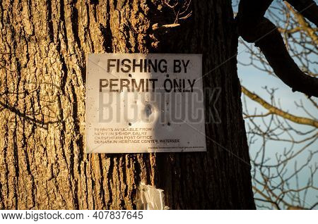 Dalry, Scotland - December 21st 2020: Dalry Angling Association Sign Warning Of Fishing By Permit On