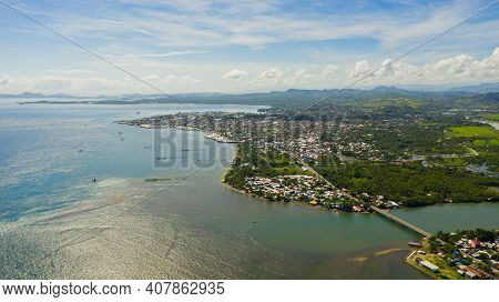Aerial View Of Surigao Is A City Located On The Island Of Mindanao, Philippines. City With A Dense D