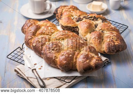 Tsoureki Braid, Greek Easter Sweet Bread, On Wood. Happy Easter.