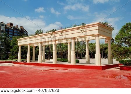 VALENCIA, SPAIN - SEPTEMBER 5, 2019: Decorative colonnades in the Turia river park. The 9km long park was created after diverting the Turia river to prevent flooding.