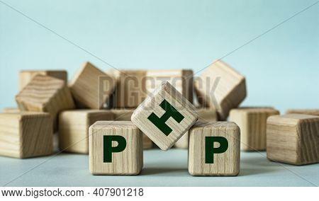 Php (hypertext Preprocessor) - Acronym On Wooden Cubes On A Light Background. Business Concept