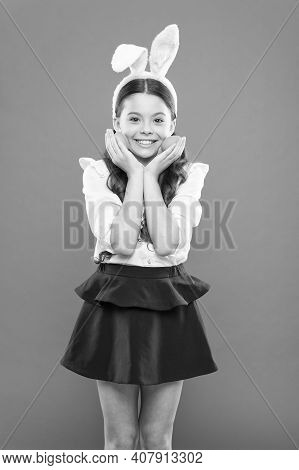 Little Schoolgirl In Rabbit Ears. Easter Eggs. Happy Easter. Tradition Of Decorating Eggs Of All Kin