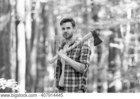 Usual Work. Man Ready For Splitting Wood And Cutting Firewood With Axe. Prepare To Chop Down Tree. C